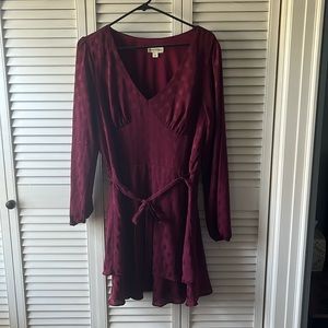 Women’s large mini flow dress, v neckline, two layer bottom to accent any figure